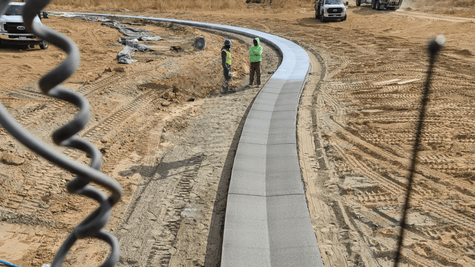 Long precast concrete box culvert installation in trench
